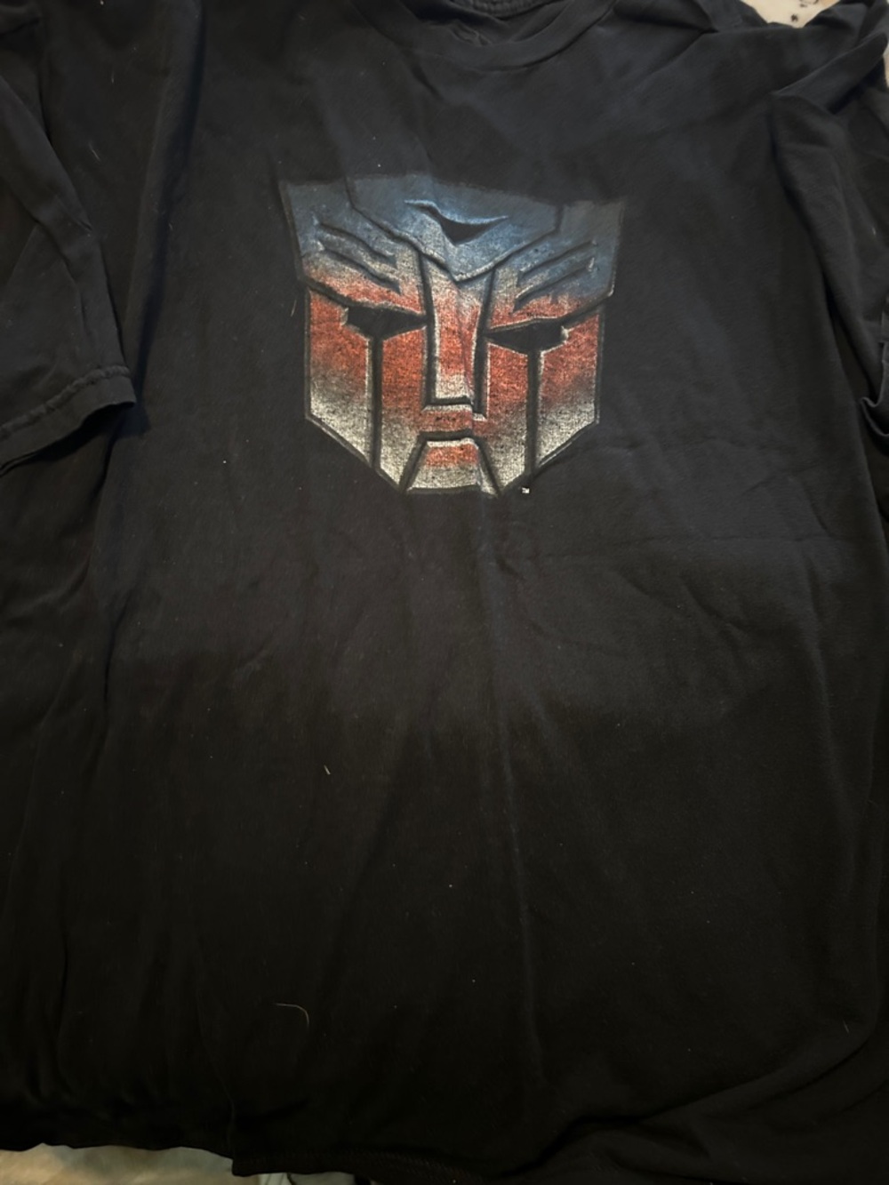 Black Men’s Graphic T-Shirt with Red and Blue Emblem